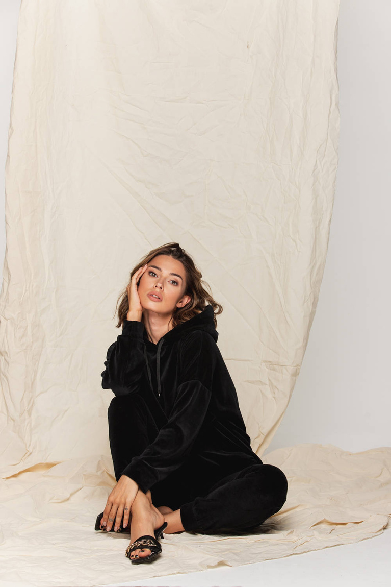 Over Black Sweatshirt